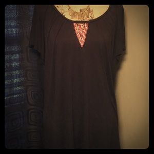 Darling loose fitting beaded design top!