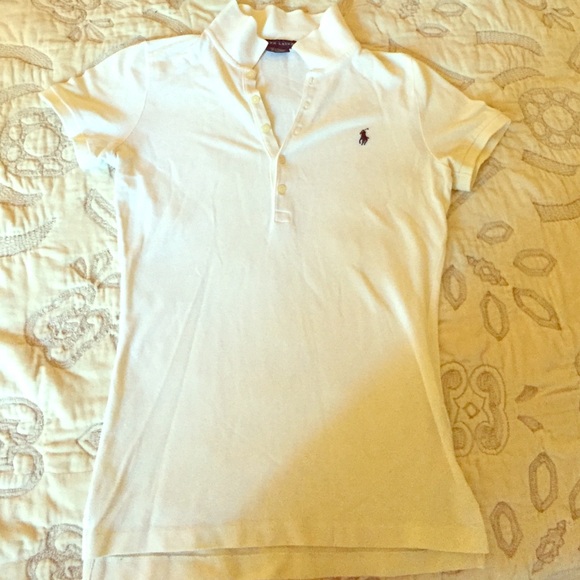 Cream Ralph Lauren polo with navy polo player .