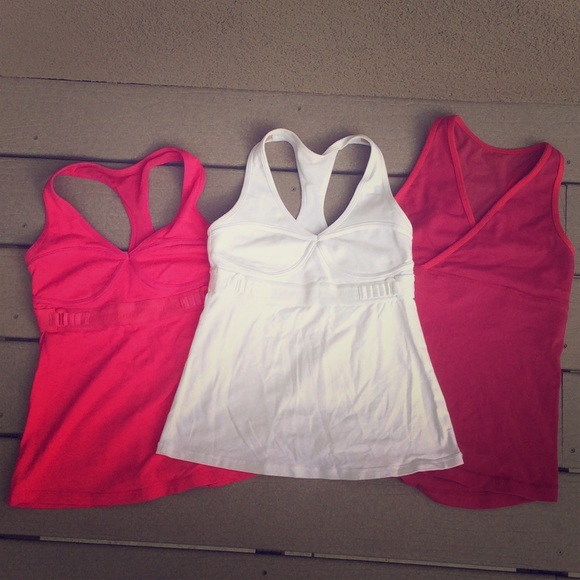 Two Lululemon tanks plus one free! Size 6