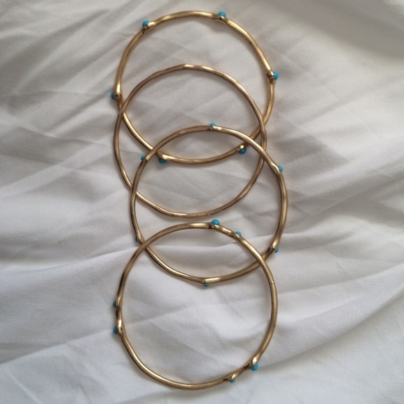 A set of four turquoise and gold bangles!!