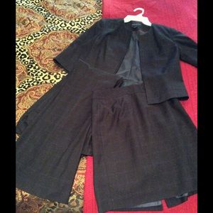 3 piece navy suit. Pants skirt and jacket.