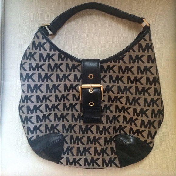 Michael Kors MK over the shoulder handbag