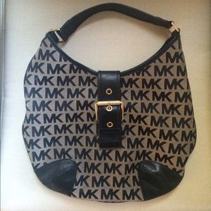 Michael Kors MK over the shoulder handbag