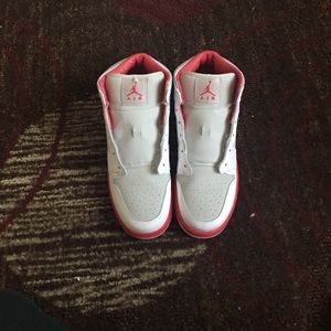 Pink and white Jordan Air Force ones