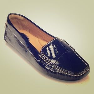 Black patent leather loafers by Clark's Artisan.