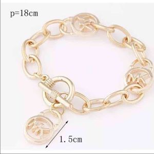 Mk bracelet goldtone