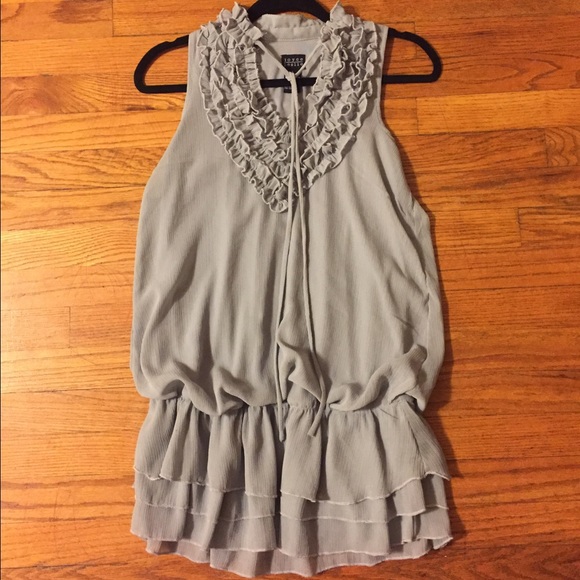 Never worn top. Great with leggings!