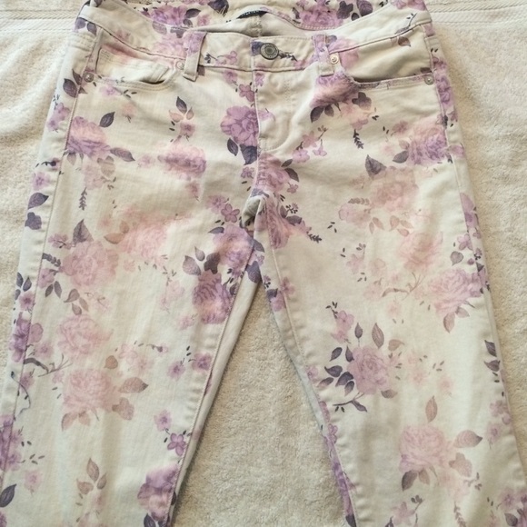 Skinny violet and white American eagle jeans