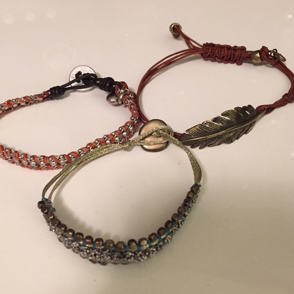 2 Fossil feather metal bracelets and 1 aerie