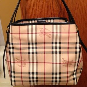 Brand new Burberry purse/clutch is also included