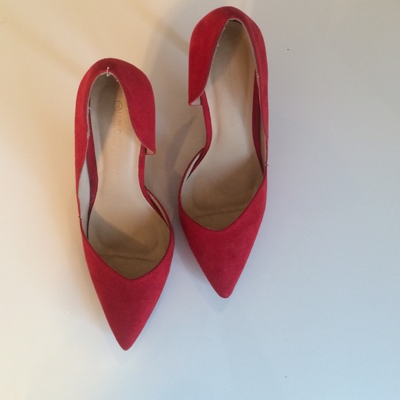Red suede pumps