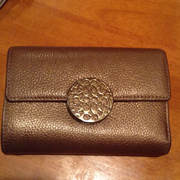 Coach gold wallet - very gently used.