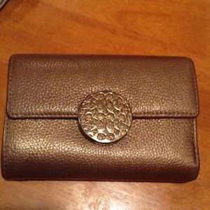 Coach gold wallet - very gently used.