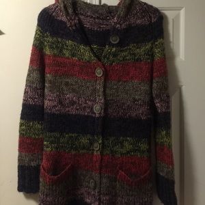 Long hooded sweater.