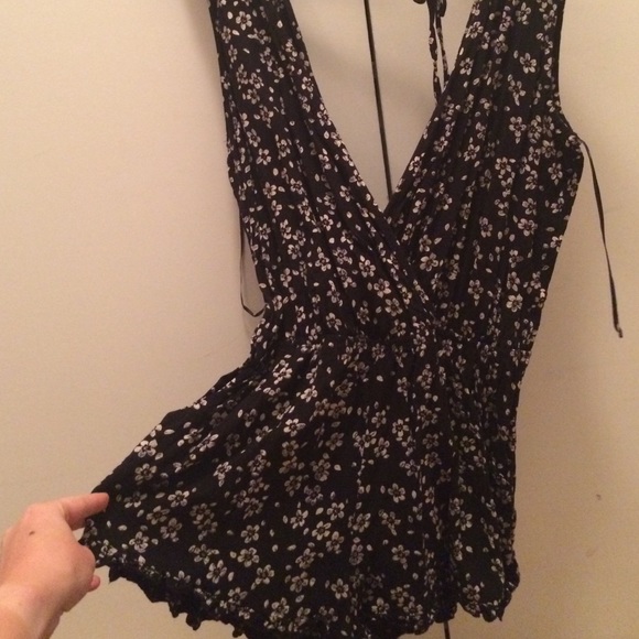 Black with flowers ruffled romper from Lulu's