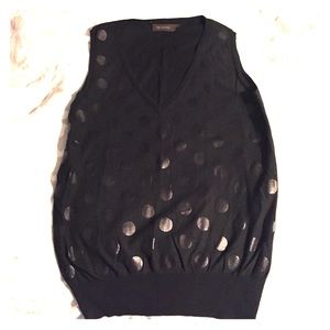 Black polka dot sweater vest.