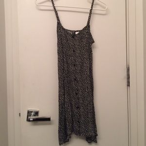 Cute button down floral dress with flattering side