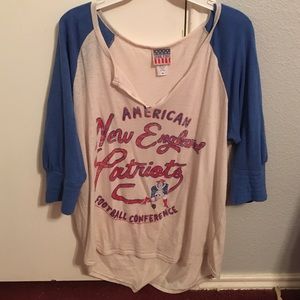 New England Patriots shirt.