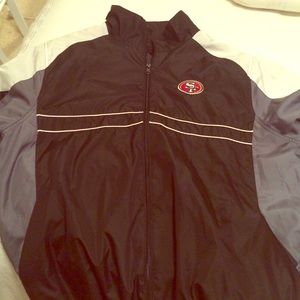 Lightweight, 49er rain coat. Black gray and white