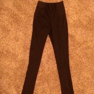 High waisted black polka dot pants/leggings.