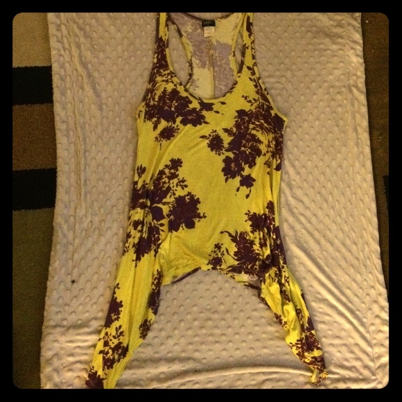 Stylish flowing racer back floral top.