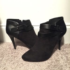 Black high heeled ankle boots