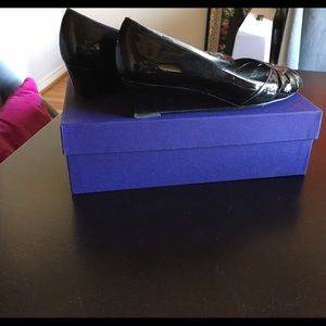 Patent leather Stuart Weitzman shoes