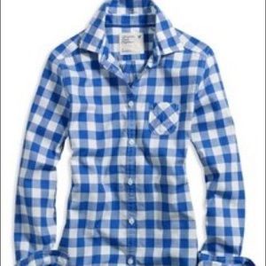 Warm long sleeve blue/white plaid shirt. Size 2.