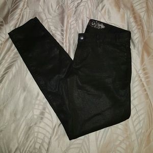 Black coated jean leggings
