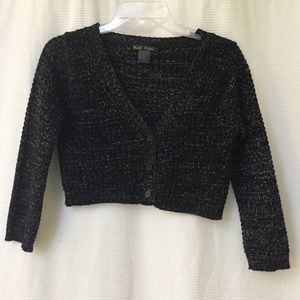 Short black sweater.