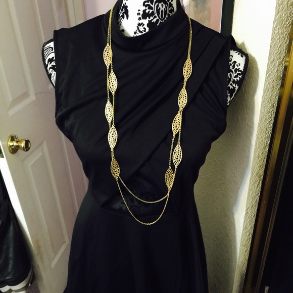 Beautiful LBD w sexy sheer openings size: medium
