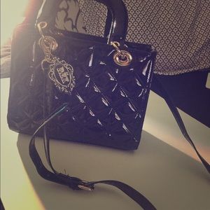 Black faux patent bag