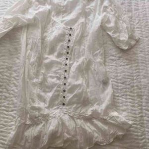 A white tunic from Zara in cotton.