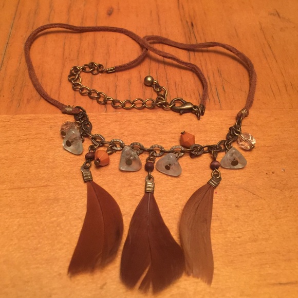 Necklace with beads and feathers