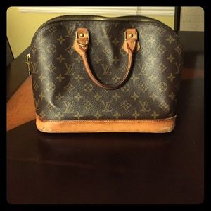 LV Alma bag. 100% Authentic.