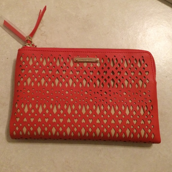 NWOT Coral and tan cutout clutch