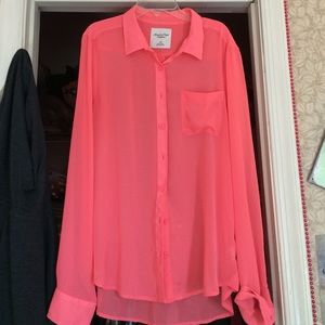 Sheer neon pink blouse