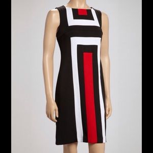 High end work or cocktail dress.
