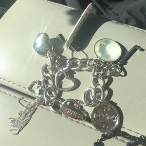 Guess charm bracelet and Guess necklace.