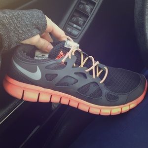 Coral pink and black nike free