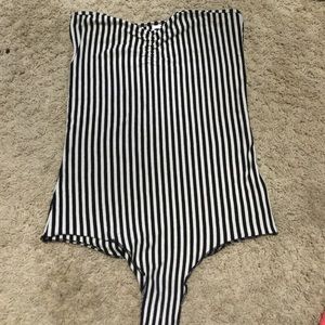 Striped leotard never worn. Soft to the touch