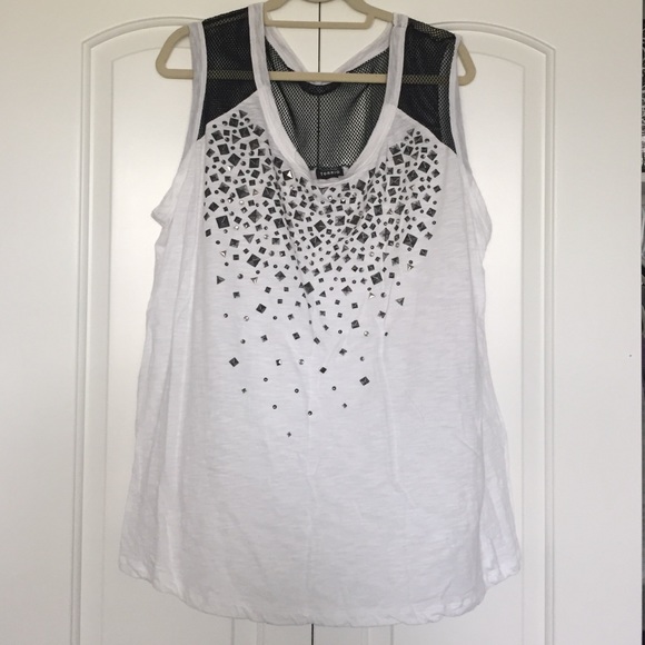 Torrid white tank with mesh panels and studs.