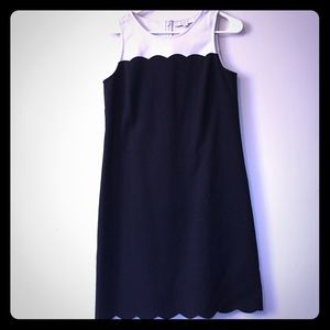 Black and Tan dress with bottom detail