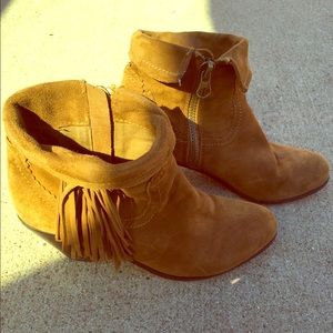 Lightly warn fringe booties.