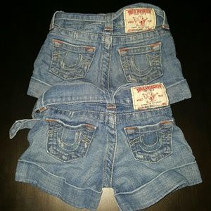 Two toddler pairs of True Religion shorts