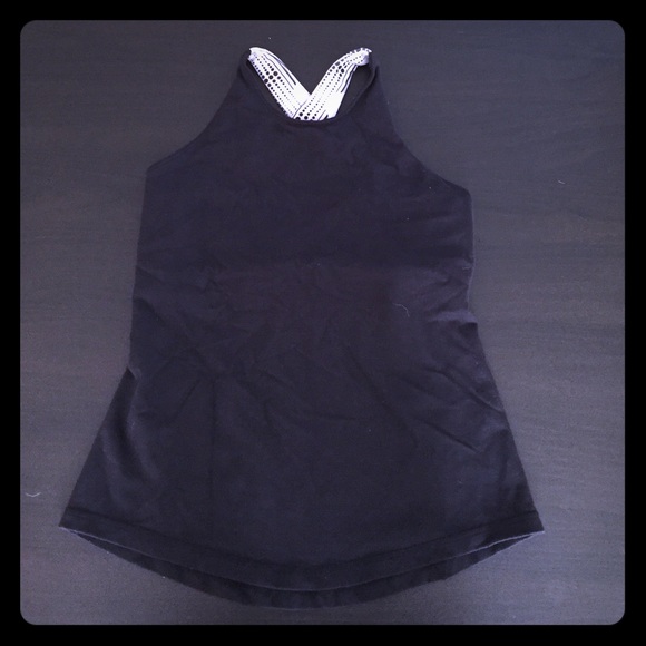 Black lulu tank with white straps.