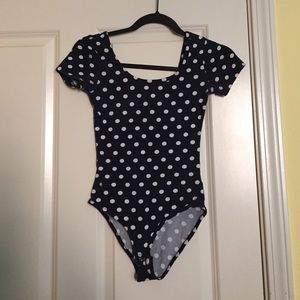 Retro polka dot bodysuit made to impress.