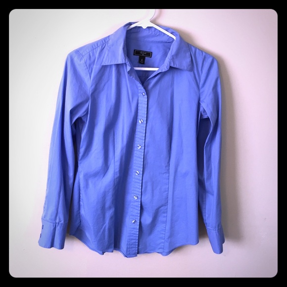 Long sleeve blue button up shirt.