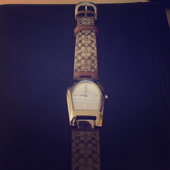 Brown leather COACH watch with silver face