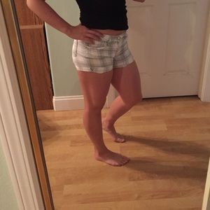 White shorts with grey stripes